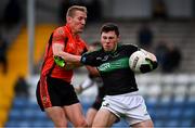4 October 2020; Mark Cronin of Nemo Rangers in action against John McLoughlin of Duhallow during the Cork County Premier Senior Football Championship Semi-Final match between Nemo Rangers and Duhallow at Páirc Ui Rinn in Cork. Photo by Sam Barnes/Sportsfile