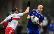 4 October 2020; Ciaran O'Ferraigh of Ratoath in action against James Reilly of Gaeil Colmcille during the Meath County Senior Football Championship Final match between Ratoath and Gaeil Colmcille at Páirc Táilteann in Navan, Meath. Photo by Brendan Moran/Sportsfile