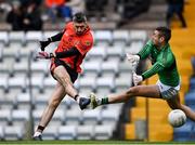 4 October 2020; Seamus Hickey of Duhallow shoots to score his side's first goal despite the efforts of Michael Aodh Martin of Nemo Rangers during the Cork County Premier Senior Football Championship Semi-Final match between Nemo Rangers and Duhallow at Páirc Ui Rinn in Cork. Photo by Sam Barnes/Sportsfile