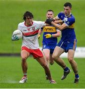 4 October 2020; Oisín Reilly of Gaeil Colmcille in action against Cian O'Brien of Ratoath during the Meath County Senior Football Championship Final match between Ratoath and Gaeil Colmcille at Páirc Táilteann in Navan, Meath. Photo by Brendan Moran/Sportsfile