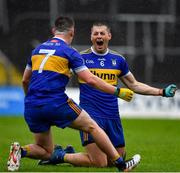 4 October 2020; Gavin McGowan, 6, celebrates with Ratoath team-mate Andrew Gerrard at the final whistle of the Meath County Senior Football Championship Final match between Ratoath and Gaeil Colmcille at Páirc Táilteann in Navan, Meath. Photo by Brendan Moran/Sportsfile