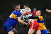 4 October 2020; Seamus Mattimoe of Gaeil Colmcille is tackled by Ben Wyer, left, and Shane Duffy of Ratoath, resulting in a penalty during the Meath County Senior Football Championship Final match between Ratoath and Gaeil Colmcille at Páirc Táilteann in Navan, Meath. Photo by Brendan Moran/Sportsfile