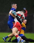 4 October 2020; Seamus Mattimoe of Gaeil Colmcille is tackled by Ben Wyer, left, and Shane Duffy of Ratoath, resulting in a penalty during the Meath County Senior Football Championship Final match between Ratoath and Gaeil Colmcille at Páirc Táilteann in Navan, Meath. Photo by Brendan Moran/Sportsfile