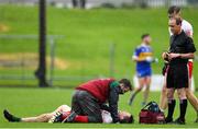 4 October 2020; Conal Courtney of Gaeil Colmcille receives medical attention following a collision with Emmett Boyle of Ratoath, which resulted in a red card, during the Meath County Senior Football Championship Final match between Ratoath and Gaeil Colmcille at Páirc Táilteann in Navan, Meath. Photo by Brendan Moran/Sportsfile