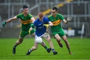 4 October 2020; Ciarán Egan of Tullamore in action against Conor McNamee, left, and Ciarán Heavey of Rhode during the Offaly County Senior Football Championship Final match between Rhode and Tullamore at Bord na Móna O'Connor Park in Tullamore, Offaly. Photo by Piaras Ó Mídheach/Sportsfile