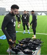 5 October 2020; Derrick Williams picks his GPS device during an activation session prior to a Republic of Ireland training session at the Sport Ireland National Indoor Arena in Dublin.  Photo by Stephen McCarthy/Sportsfile