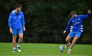 6 October 2020; Ross Byrne, right, watched by his brother Harry Byrne during Leinster Rugby squad training at UCD in Dublin. Photo by Brendan Moran/Sportsfile