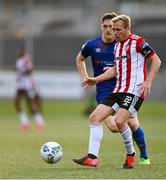2 October 2020; Conor McCormack of Derry City in action against John Martin of Waterford during the SSE Airtricity League Premier Division match between Derry City and Waterford at Ryan McBride Brandywell Stadium in Derry. Photo by Piaras Ó Mídheach/Sportsfile