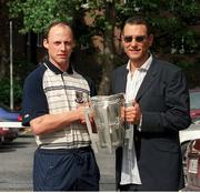 9 September 2002; Kilkenny captain Andy Comerford. with the Liam MacCarthy cup, meets former soccer player and actor Vinnie Jones at the Burlington Hotel, Dublin. Hurling. Photo by Brendan Moran/Sportsfile