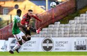 9 October 2020; Danny Grant of Bohemians shoots to score his side's second goal despite the attentions of Joseph Olowu of Cork City during the SSE Airtricity League Premier Division match between Bohemians and Cork City at Dalymount Park in Dublin. Photo by Matt Browne/Sportsfile