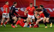 10 October 2020; Ben Healy of Munster is tackled by Hamish Watson of Edinburgh during the Guinness PRO14 match between Munster and Edinburgh at Thomond Park in Limerick. Photo by Ramsey Cardy/Sportsfile