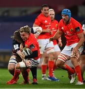 10 October 2020; Craig Casey of Munster is tackled by Ben Toolis of Edinburgh during the Guinness PRO14 match between Munster and Edinburgh at Thomond Park in Limerick. Photo by Ramsey Cardy/Sportsfile