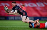 10 October 2020; George Taylor of Edinburgh is tackled by Alex McHenry of Munster during the Guinness PRO14 match between Munster and Edinburgh at Thomond Park in Limerick. Photo by Ramsey Cardy/Sportsfile