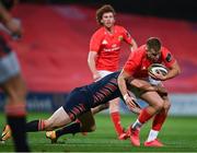 10 October 2020; Alex McHenry of Munster is tackled by Hamish Watson of Edinburgh during the Guinness PRO14 match between Munster and Edinburgh at Thomond Park in Limerick. Photo by Ramsey Cardy/Sportsfile
