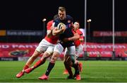 10 October 2020; Duhan van der Merwe of Edinburgh is tackled by Matt Gallagher, left, and Jack O'Donoghue of Munster during the Guinness PRO14 match between Munster and Edinburgh at Thomond Park in Limerick. Photo by Ramsey Cardy/Sportsfile