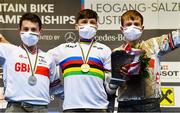11 October 2020; Gold medallist Oisin O’Callaghan of Ireland, centre, with silver medallist Daniel Slack of Great Britain, left, and bronze medallist James Elliott following the Junior Men’s Downhill event during the UCI 2020 Mountain Bike World Championships in Salzburg, Austria. Photo by Simon Wilkinson/Sportsfile