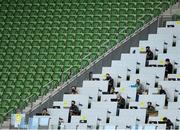 11 October 2020; Members of the press in the media tribune during the UEFA Nations League B match between Republic of Ireland and Wales at the Aviva Stadium in Dublin. Photo by Seb Daly/Sportsfile