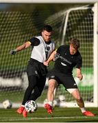 12 October 2020; Aaron Connolly is tackled by Daryl Horgan during a Republic of Ireland training session at the FAI National Training Centre in Abbotstown, Dublin. Photo by Stephen McCarthy/Sportsfile