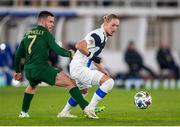 14 October 2020; Fredrik Jenson of Finland is tackled by Aaron Connolly of Republic of Ireland during the UEFA Nations League B match between Finland and Republic of Ireland at Helsingin Olympiastadion in Helsinki, Finland. Photo by Mauri Forsblom/Sportsfile