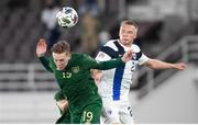 14 October 2020; Ronan Curtis of Republic of Ireland and Ilmari Niskanen of Finland during the UEFA Nations League B match between Finland and Republic of Ireland at Helsingin Olympiastadion in Helsinki, Finland. Photo by Mauri Forsblom/Sportsfile