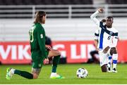 14 October 2020; Glen Kamara of Finland and Jeff Hendrick of Republic of Ireland take a knee in support of the Black Lives Matter movement ahead of the UEFA Nations League B match between Finland and Republic of Ireland at Helsingin Olympiastadion in Helsinki, Finland. Photo by Mauri Fordblom/Sportsfile