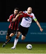 16 October 2020; Danny Mandroiu of Bohemians is fouled by Chris Shields of Dundalk during the SSE Airtricity League Premier Division match between Dundalk and Bohemians at Oriel Park in Dundalk, Louth. Photo by Harry Murphy/Sportsfile