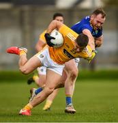 17 October 2020; Patrick McBride of Antrim in action against Eoin Murtagh of Wicklow during the Allianz Football League Division 4 Round 6 match between Wicklow and Antrim at the County Grounds in Aughrim, Wicklow. Photo by Ray McManus/Sportsfile