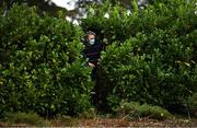 17 October 2020; A local spectator attempts to get a view of the game from behind a bush during the Allianz Football League Division 1 Round 6 match between Monaghan and Kerry at Grattan Park in Inniskeen, Monaghan. Photo by Brendan Moran/Sportsfile