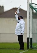 17 October 2020; An umpire, wearing a facemask, waves the white flag to indicate a point during the Allianz Football League Division 1 Round 6 match between Monaghan and Kerry at Grattan Park in Inniskeen, Monaghan. Photo by Brendan Moran/Sportsfile