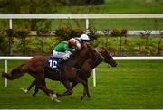 17 October 2020; Lobo Rojo, near, with Shane Foley up, races alongside eventual second place Vermilion Cliffs, far, with Padraig Beggy up, on their way to winning the Leopardstown Members Club Maiden at Leopardstown Racecourse in Dublin. Photo by Seb Daly/Sportsfile