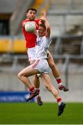 17 October 2020; Damien Gore of Cork in action against Sam Mulroy of Louth during the Allianz Football League Division 3 Round 6 match between Cork and Louth at Páirc Ui Chaoimh in Cork. Photo by Harry Murphy/Sportsfile