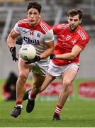 17 October 2020; Colm O'Callaghan of Cork in action against Dermot Campbell of Louth during the Allianz Football League Division 3 Round 6 match between Cork and Louth at Páirc Ui Chaoimh in Cork. Photo by Harry Murphy/Sportsfile