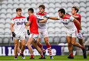 17 October 2020; Ian MaGuire of Cork tussles with Emmet Carolan of Louth during the Allianz Football League Division 3 Round 6 match between Cork and Louth at Páirc Ui Chaoimh in Cork. Photo by Harry Murphy/Sportsfile