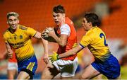 17 October 2020; Oisín O'Neill of Armagh in action against Cathal Compton, left, and David Murray of Roscommon during the Allianz Football League Division 2 Round 6 match between Armagh and Roscommon at the Athletic Grounds in Armagh. Photo by Piaras Ó Mídheach/Sportsfile