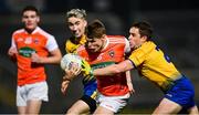 17 October 2020; Oisín O'Neill of Armagh in action against Cathal Compton, left, and David Murray of Roscommon during the Allianz Football League Division 2 Round 6 match between Armagh and Roscommon at the Athletic Grounds in Armagh. Photo by Piaras Ó Mídheach/Sportsfile