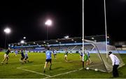 17 October 2020; Barry Dardis of Meath fists a point over Dublin goalkeeper Stephen Cluxton during the Allianz Football League Division 1 Round 6 match between Dublin and Meath at Parnell Park in Dublin. Photo by Ramsey Cardy/Sportsfile