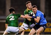 17 October 2020; Con O'Callaghan of Dublin is tackled by Eoin Harkin, left, and David Toner of Meath during the Allianz Football League Division 1 Round 6 match between Dublin and Meath at Parnell Park in Dublin. Photo by Ramsey Cardy/Sportsfile