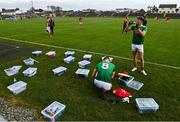 18 October 2020; Mayo players Matthew Ruane, 8, and Fionn McDonagh prepare for the match with their individual boxes during the Allianz Football League Division 1 Round 6 match between Galway and Mayo at Tuam Stadium in Tuam, Galway. Photo by Ramsey Cardy/Sportsfile