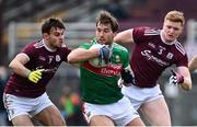 18 October 2020; Aidan O'Shea of Mayo in action against Cillian McDaid, left, and Séan Andy Ó Ceallaigh of Galway during the Allianz Football League Division 1 Round 6 match between Galway and Mayo at Tuam Stadium in Tuam, Galway. Photo by Ramsey Cardy/Sportsfile