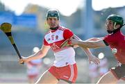 18 October 2020; Fintan Bradley of Derry in action against Michael Hughes of Down during the Allianz Hurling League Division 2B Final match between Down and Derry at the Athletic Grounds in Armagh. Photo by Sam Barnes/Sportsfile