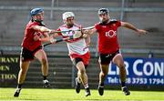 18 October 2020; Eamon McGill of Derry in action against Conor Woods, left and Tom Murray of Down during the Allianz Hurling League Division 2B Final match between Down and Derry at the Athletic Grounds in Armagh. Photo by Sam Barnes/Sportsfile