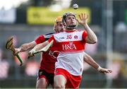 18 October 2020; Paul Cleary of Derry in action against Matt Conlon of Down during the Allianz Hurling League Division 2B Final match between Down and Derry at the Athletic Grounds in Armagh. Photo by Sam Barnes/Sportsfile