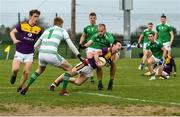 18 October 2020; John Tubritt of Wexford is tackled by Sean O'Dea of Limerick during the Allianz Football League Division 4 Round 6 match between Limerick and Wexford at Mick Neville Park in Rathkeale, Limerick. Photo by Eóin Noonan/Sportsfile