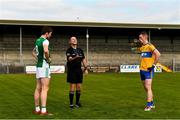 18 October 2020; Referee James Bermingham performs the pre-match coin toss in the company of Fermanagh captain Eoin Donnelly and Clare captain Eoin Cleary at the Allianz Football League Division 2 Round 6 match between Clare and Fermanagh at Cusack Park in Ennis, Clare. Photo by Diarmuid Greene/Sportsfile