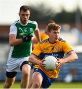 18 October 2020; Padraic Collins of Clare in action against Ryan Jones of Fermanagh during the Allianz Football League Division 2 Round 6 match between Clare and Fermanagh at Cusack Park in Ennis, Clare. Photo by Diarmuid Greene/Sportsfile