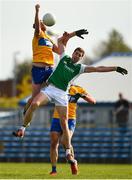 18 October 2020; Cian O'Dea of Clare competes for a high ball with Eoin Donnelly of Fermanagh during the Allianz Football League Division 2 Round 6 match between Clare and Fermanagh at Cusack Park in Ennis, Clare. Photo by Diarmuid Greene/Sportsfile