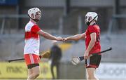 18 October 2020; Eamon McGill of Derry and Eoghan Sands of Down bump fists following the Allianz Hurling League Division 2B Final match between Down and Derry at the Athletic Grounds in Armagh. Photo by Sam Barnes/Sportsfile