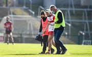 18 October 2020; Richie Mullan of Derry is helped off the field after picking up an injury during the Allianz Hurling League Division 2B Final match between Down and Derry at the Athletic Grounds in Armagh. Photo by Sam Barnes/Sportsfile