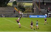 18 October 2020; Aidan O'Shea of Mayo climbs above Séan Andy Ó Ceallaigh of Galway during the Allianz Football League Division 1 Round 6 match between Galway and Mayo at Tuam Stadium in Tuam, Galway. Photo by Ramsey Cardy/Sportsfile