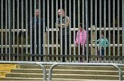 18 October 2020; Spectators watch on from outside the stadium during the Allianz Football League Division 1 Round 6 match between Donegal and Tyrone at MacCumhail Park in Ballybofey, Donegal. Photo by David Fitzgerald/Sportsfile